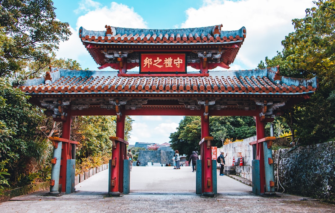 Stone walls and curved gates of Shuri Castle Park in Naha during the ongoing main hall reconstruction in 2026