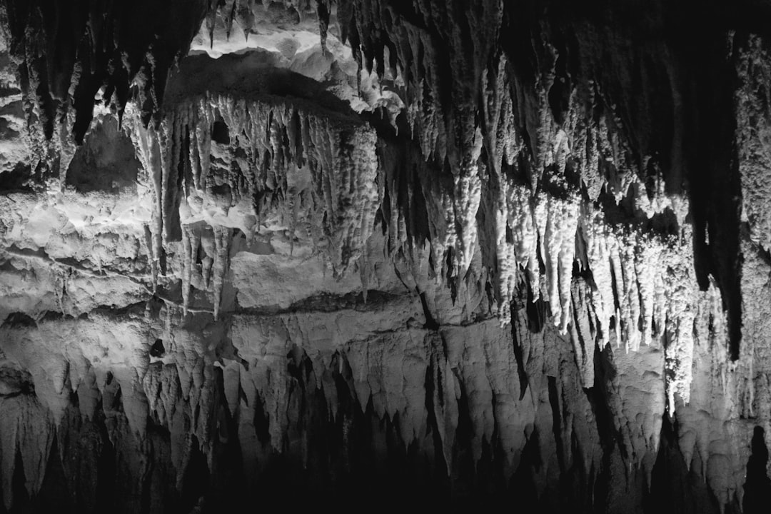 Lit stalactite formations above the raised concrete walkway inside Gyokusendo Cave at Okinawa World in Nanjo, southern Okinawa